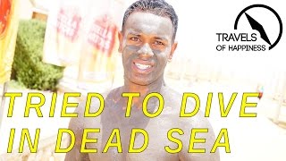 Trying to dive in Dead Sea