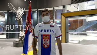Australia: Fans wait at Melbourne Airport as tennis player Novak Djokovic held with visa issues