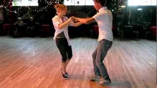 Tues Blues Denver Co teachers Ben Collins and Jessica Miltenberger dance together