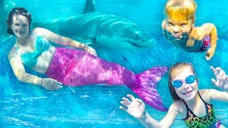 SWIMMING WITH REAL MERMAIDS AND SHARKS IN NEW SWIMMING POOL!