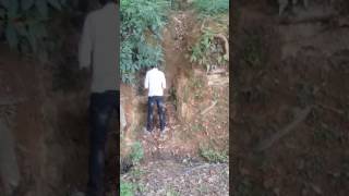 Boy pissing in public.