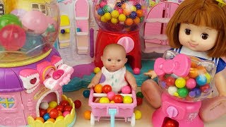 Candy dispenser and Baby doll surprise eggs mart toys play