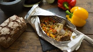 Белая рыба, запечённая с овощами в особых конвертах