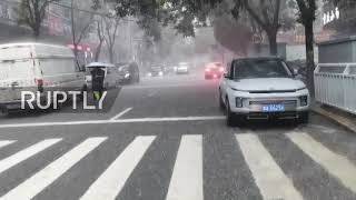 China: Roads flooded as torrential rain batters Zhengzhou