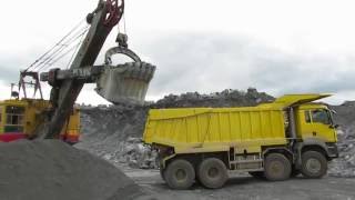 MAN TGS 41.480 8X8 ЭКГ 5 загрузка горной массой