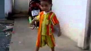 Bruce Lee Kid Playing Nunchucks (Nunchaku)