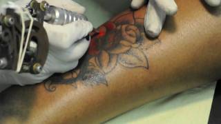 Cover-up tattoo by Roger