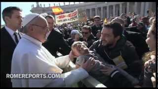Pope descends Popemobile to bless disabled man before Inaugural Mass