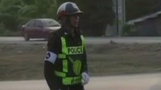 Distraction: Dancing traffic cop