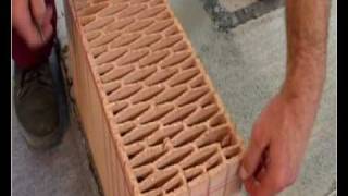 Portotherm  Укладка первого ряда блоков