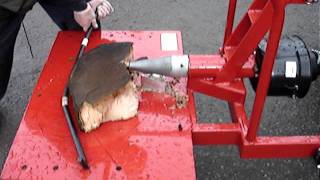 Screw type PTO log splitter fitted to Kioti CK22 compact tractor