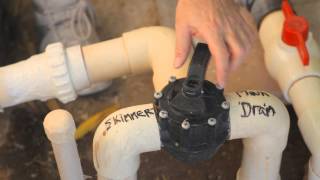 How to Drain Water From an In-Ground Pool With a Drain at the Bottom : Pool Maintenance