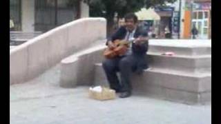 Karol, the most famous street "singer" in Martin (Slovakia)