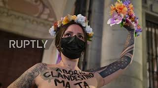 Spain: Femen activist poses shirtless outside Madrid church in pro-abortion rights action *EXPLICIT*