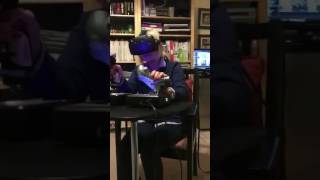 Mum landing a plane on Aerofly in HTC VIVE VR headset