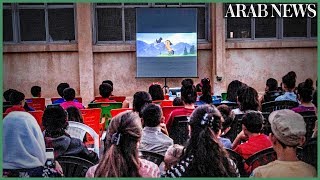 Mobile cinema brings movie magic to Syria Kurd children