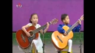 North Korean Kids  playing guitar amazing skills - 2013 song