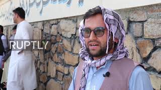 Afghanistan: Kabul residents gather outside evacuated Canadian embassy in hope of visas