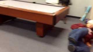 Girl rips her pants playing pool game