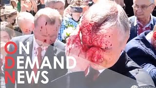 SPLAT: Russian Ambassador Hit With Red Paint In Warsaw
