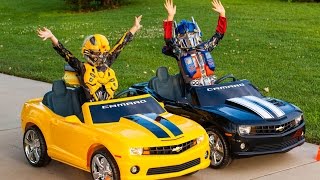 Transformers Power Wheels Race - Bumblebee vs Optimus Prime!