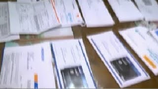 Spring Hill couple getting piles of credit cards with fictitious names sent to their address