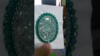 Оплетение кабашона бисером и биконусами. В процессе работы. 12 декабря 2016 г.