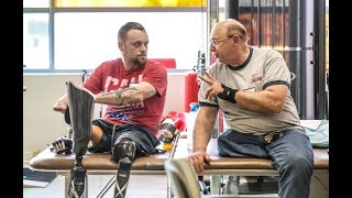 Walk before you run, Paralympic medalists teach Amputee Walking School