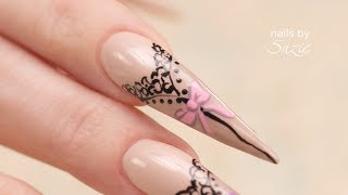 Hand Painted Stockings and Bows on Stiletto Nails