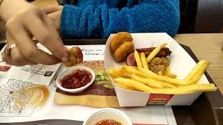 My wife eating France potato at supper market 2018