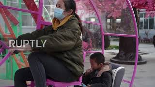 Fitness wheel - Human-powered Ferris wheel lifts happy families in the air