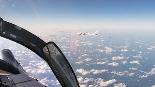 Кадры совместного воздушного патрулирования самолетами ВКС России и ВВС НОАК