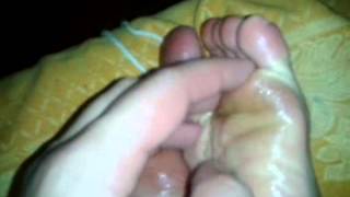 Tickling boy feet