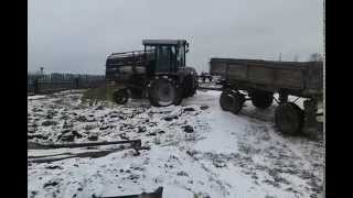 Трактор Т-28 с прицепом 2 ПТС-4. Слегка буксуем в подъем.
