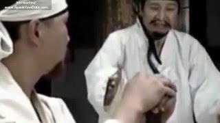 Judicial caning scene of Asian woman