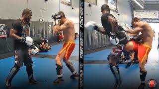 Uriah Hall knocks down sparring partner with a spinning back kick