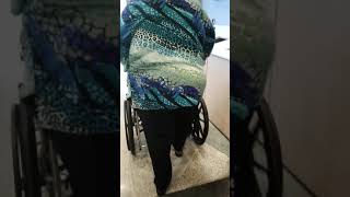 SSBBW BBW PUSHES WHEELCHAIR TO EAT.