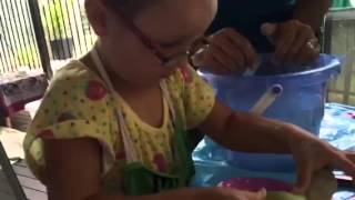 Neve on her pottery wheel