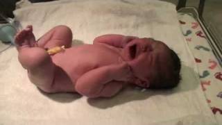Baby being born