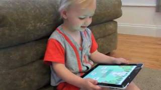 2 Year-old Ian demonstrates the iPad