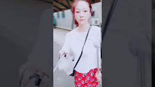 Chinese RAK amputee one leg lady selfying on her single crutch