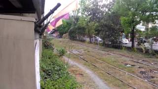 PNR DEL 918 + ex-JR East EMU 203 6 rapidly cruising at Inviernes Railroad crossing.
