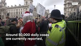 UK: Dozens rally outside Parliament as BoJo sends fresh COVID restrix to vote