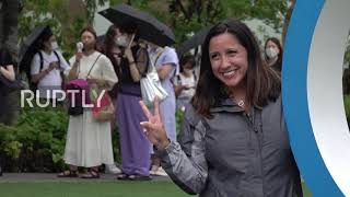 Japan: Olympic Rings statue attracts photo op-hungry sports fans