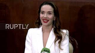 Singer and actress Natalia Oreiro receives Russian passport during ceremony in Buenos Aires