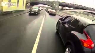angry biker punishes careless driver with a grinder