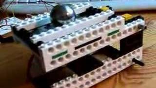 This Lego Ball Balancing Machine uses a Touchscreen and ATMega