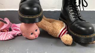 Crush doll and teddy under dr. Martens boots