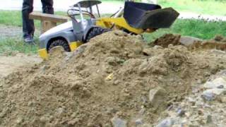 Homemade RC wheel loader in action