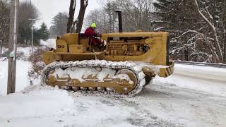 Caterpillar D8H Snow Mobile jumping..sort of